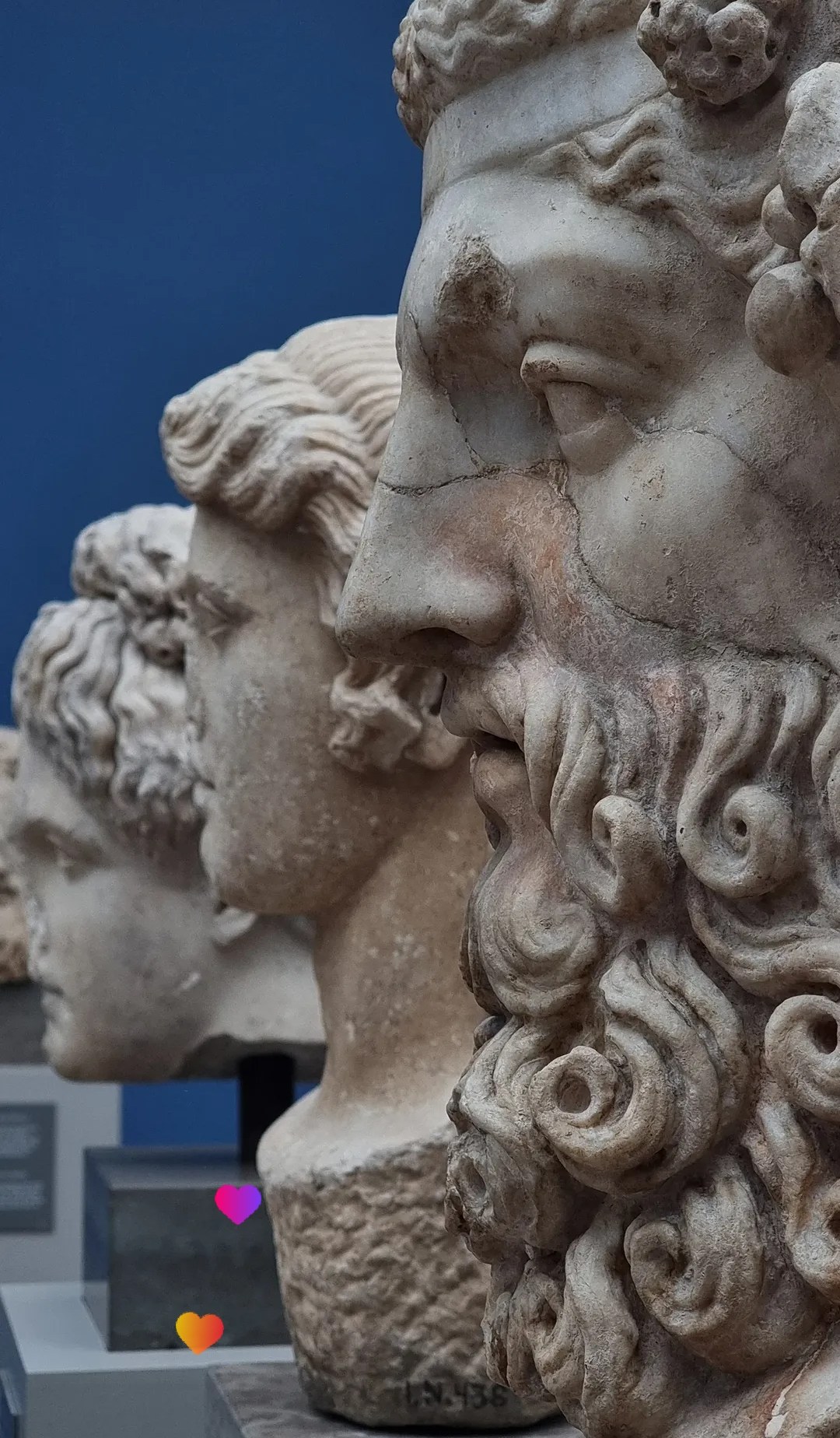 Close-up of classical sculpture faces