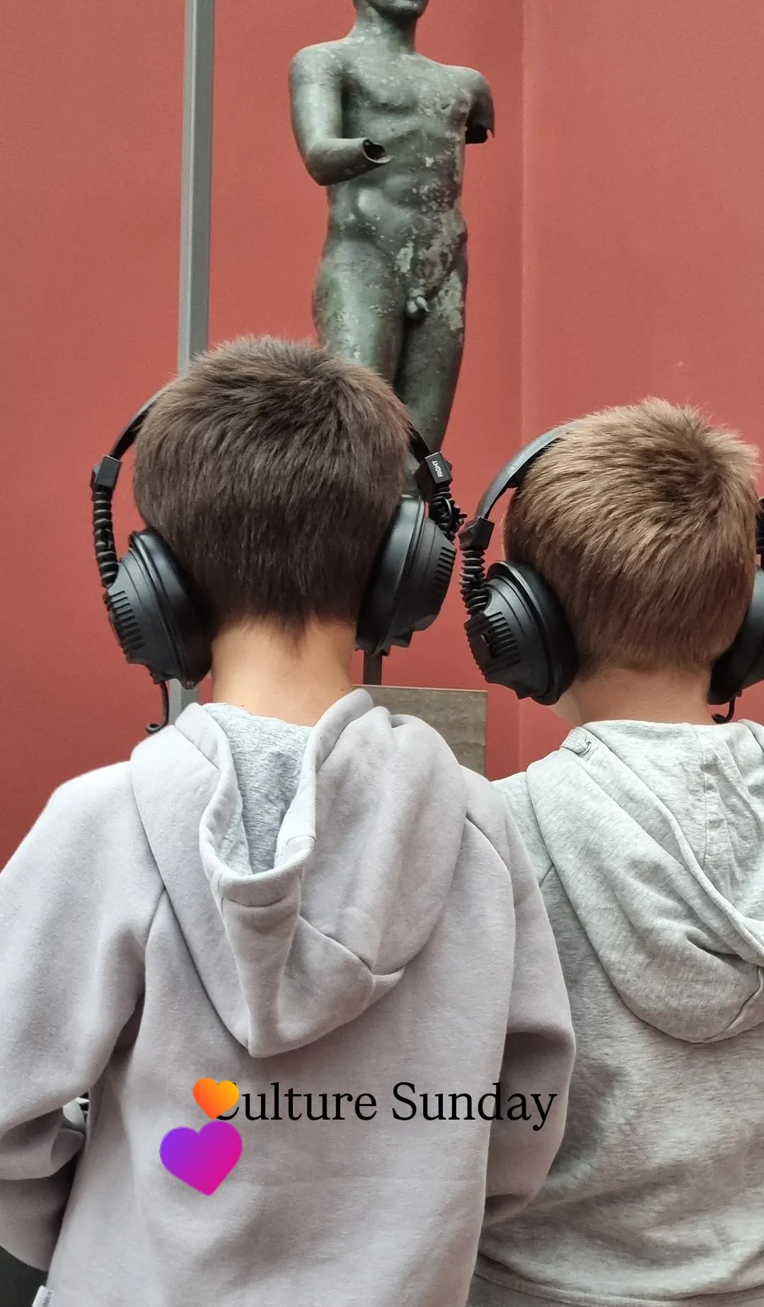 Children listening to an audio guide